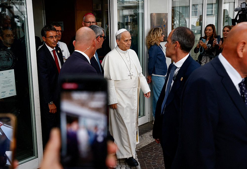 Pope Leo XIV leaves Rome's Gemelli Hospital Oct. 17, 2026, following his lung surgery and cancer diagnosis. (OSV News/Reuters/Vincenzo Livieri)