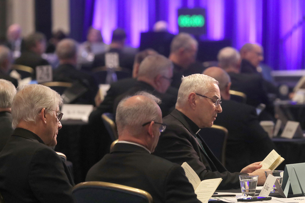 Bishops pray during a Nov. 12, 2025, session of the fall general assembly of the U.S. Conference of Catholic Bishops in Baltimore. (OSV News/Bob Roller)