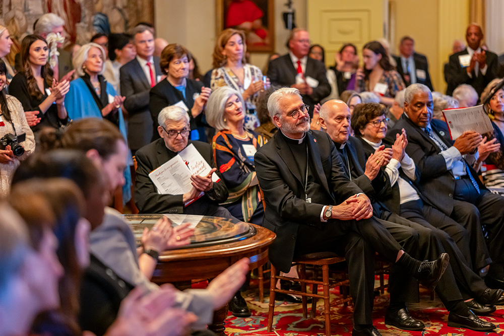 Attendees applaud at the Vatican embassy Oct. 21, 2026, during the Justice Reimagined Awards and Celebration, a Catholic Mobilizing Network event honoring capital punishment opponents. (Courtesy of of Catholic Mobilizing Network/Maximilian Franz Photography)
