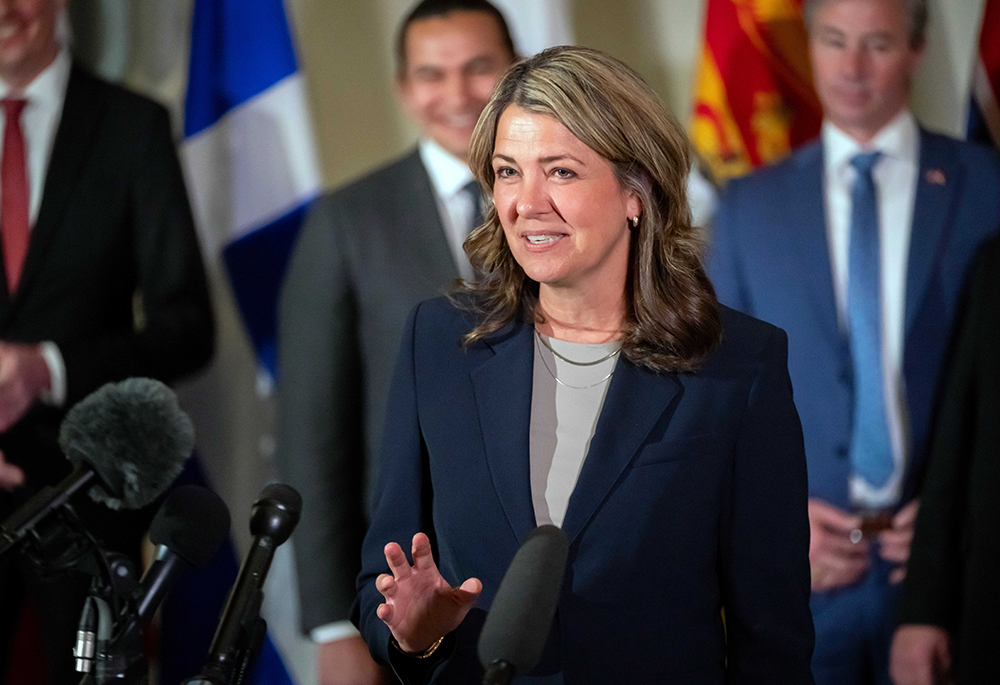 Premier of Alberta Danielle Smith, accompanied by other Council of the Federation members, speaks to reporters at the Mayflower Hotel in Washington, Feb. 12, 2025. (AP photo/Ben Curtis, file)