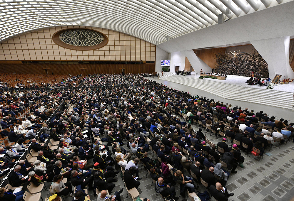 Pope Leo XIV, with regional representatives of synod teams, listens to and answers questions from participants in the Jubilee of Synodal Teams and Participatory Bodies in the Vatican audience hall Oct. 24, 2025. (CNS/Vatican Media)