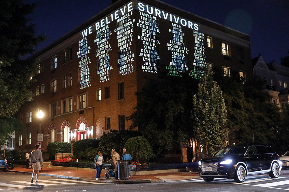 A message is projected on the side of a Cornell University building, Wednesday, Oct. 7, 2026, in Washington. (AP/Rahmat Gul)