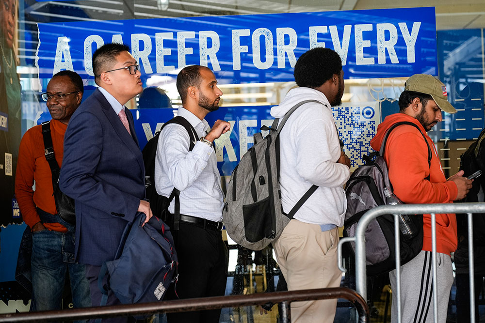 Job seekers wait in line at a job fair in New York Oct. 5, 2026. (AP/Seth Wenig)