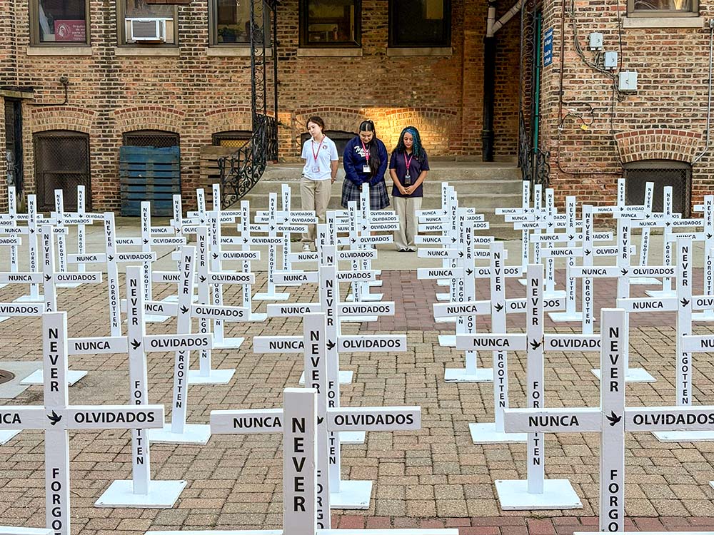 The traveling installation of immigrant crosses is seen at Our Lady of Tepeyac High School in Chicago's Little Village neighborhood, Oct. 4, 2026. (Courtesy of Meghan Murray)