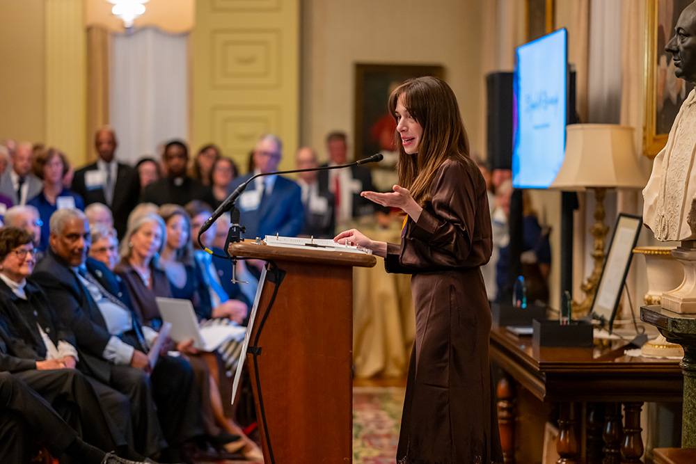 Elizabeth Bruenig, staff writer at The Atlantic, and Catholic Mobilizing Network honoree for her writings against capital punishment, addresses participants at the Vatican embassy event Oct. 21, 2026. (Courtesy of of Catholic Mobilizing Network/Maximilian Franz Photography)