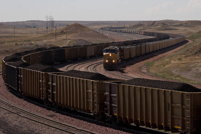 Giant coal trains pass near North Antelope Rochelle Mine in Campbell County, Wyoming, in this 2009 image. (Climate Visuals/Kimon Berlin)
