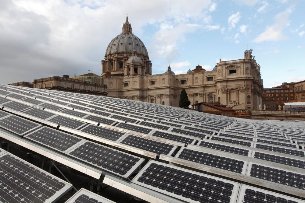 Solar panels are seen on the roof of the Paul VI audience hall at the Vatican in this Dec. 1, 2010, file photo. Under Pope Benedict XVI, Vatican City began installing solar panels in 2008. (CNS/Paul Haring)