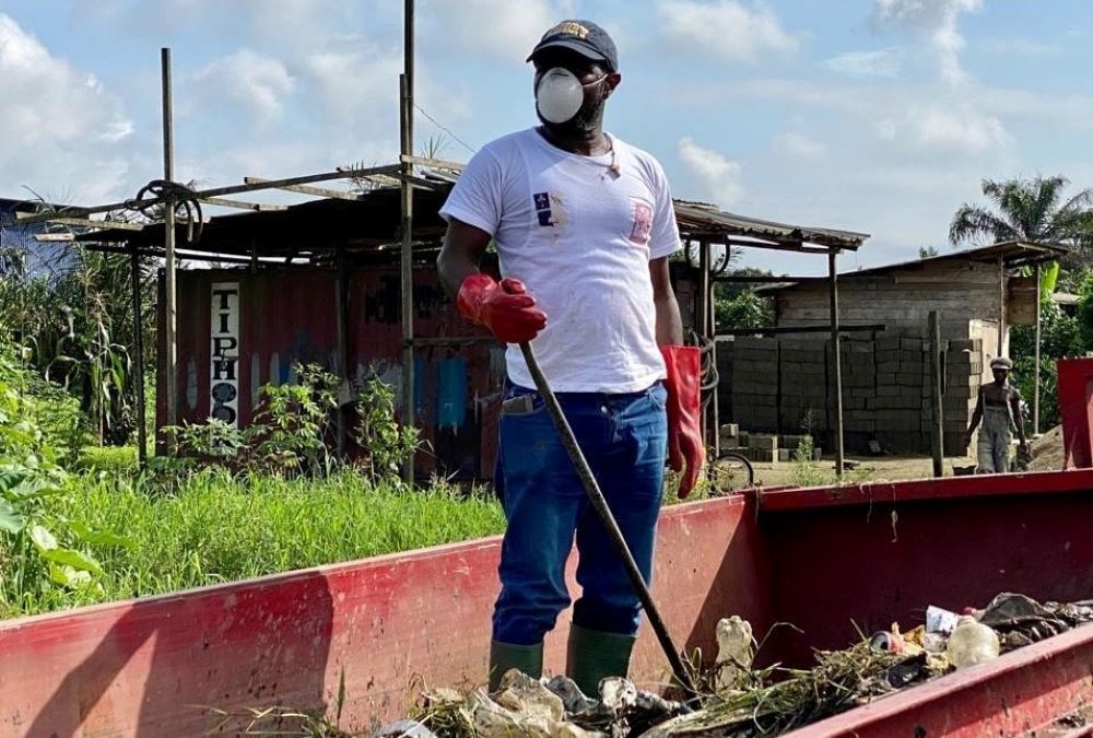 Fr. Innocent Wefon of Cameroon participates in a cleaning exercise with the Catholic Youth Network for Environmental Sustainability Africa, a grassroots lay organization that aims to empower African youth to get involved in working for a better climate. 