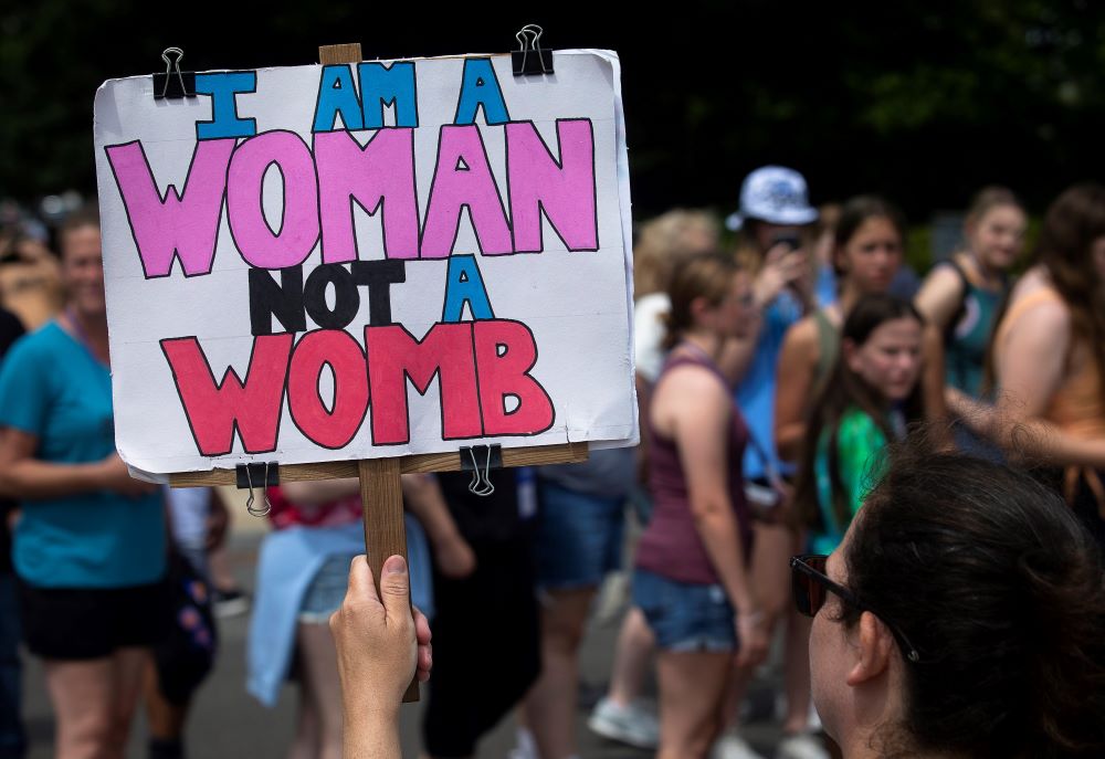 A demonstrator is seen near the Supreme Court in Washington, D.C., June 7. The court overruled the landmark 1973 Roe v. Wade abortion decision in its June 24 ruling in the Dobbs case.
