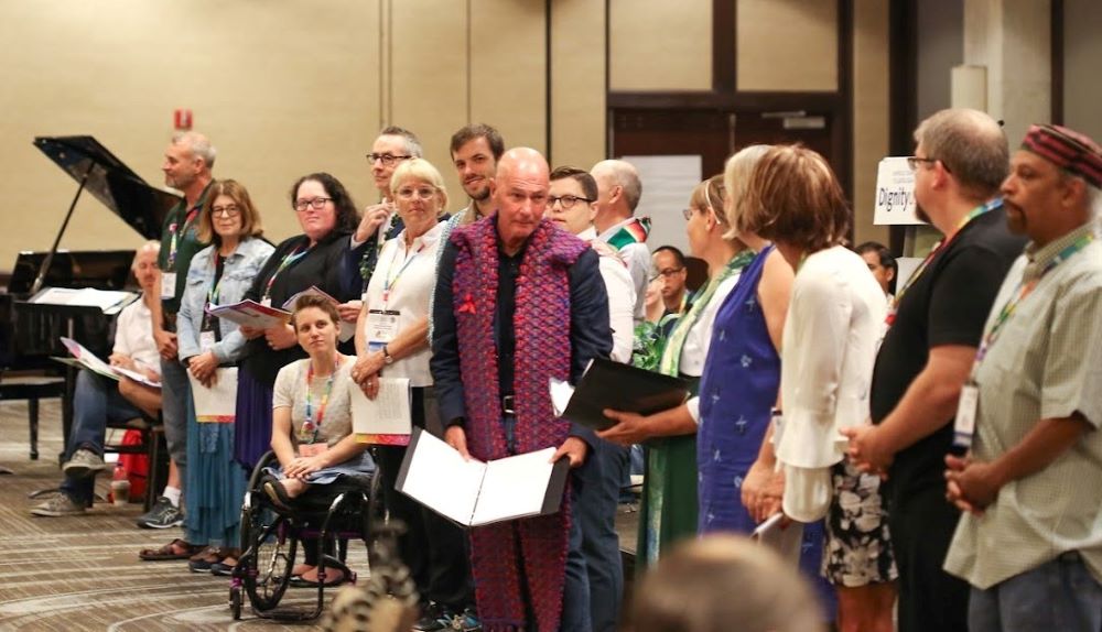 Participants of the 2019 DignityUSA conference in Chicago commission the group's board of directors. (Courtesy of DignityUSA/Deb Winarski)