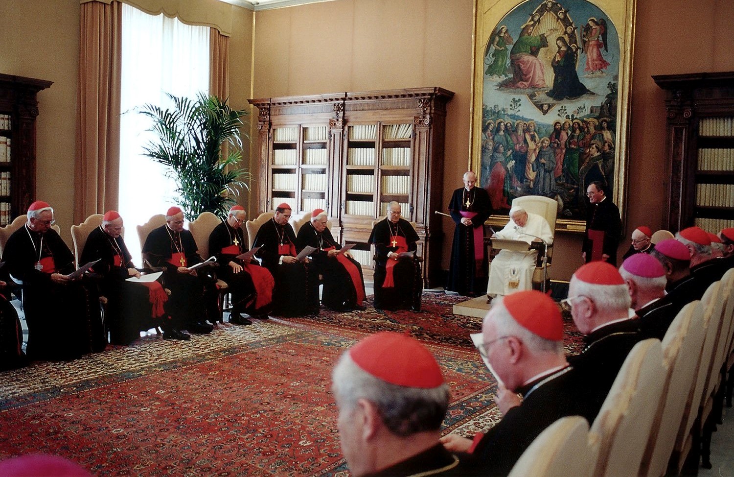 U.S. cardinals listen as Pope John Paul II addresses the special summit on clergy sexual abuse at the Vatican April 23, 2002. Cardinal Angelo Sodano, then Vatican secretary of state, is seated facing left of the pope. (CNS/Vatican Media)