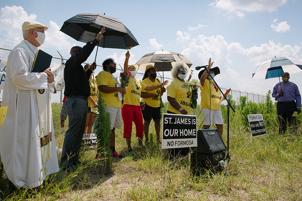 Faith leaders gather at the site of a planned $9.4 billion plastics manufacturing complex in St. James Parish, Louisiana, during a 2020 Juneteenth commemoration hosted by Rise St. James, a community group fighting construction of the plant.
