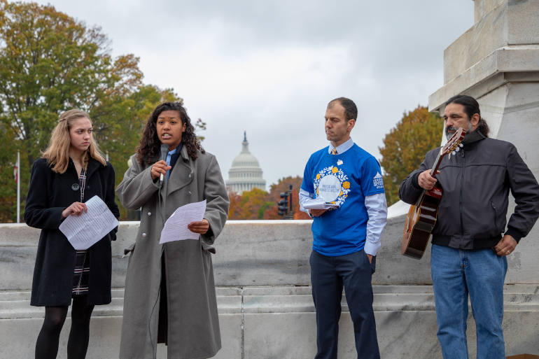 Trinity Cooper, left, and Abigail Gonzales, second from left, students at Bishop O'Dowd High School in Oakland, California, speak on environmental justice Nov. 18 during the 2019 Ignatian Family Teach-In for Justice. (Ignatian Solidarity Network)