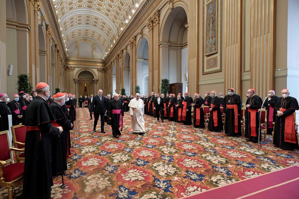 Pope Francis arrives for an audience for the annual exchange of Christmas greetings with members of the Roman Curia in the Apostolic Palace at the Vatican on Dec. 23, 2021. (Vatican Media)