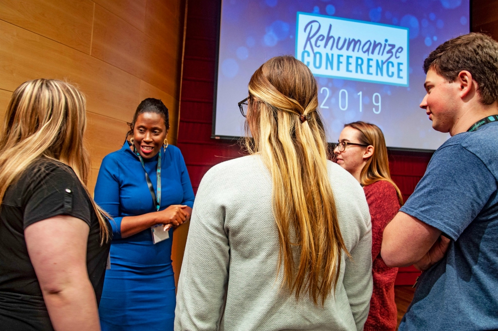 Louisiana State Rep. Katrina Jackson speaks with attendees at the Rehumanize Conference on the campus of Loyola University in New Orleans following a talk she gave on Oct. 19. (Grace Sommerville)