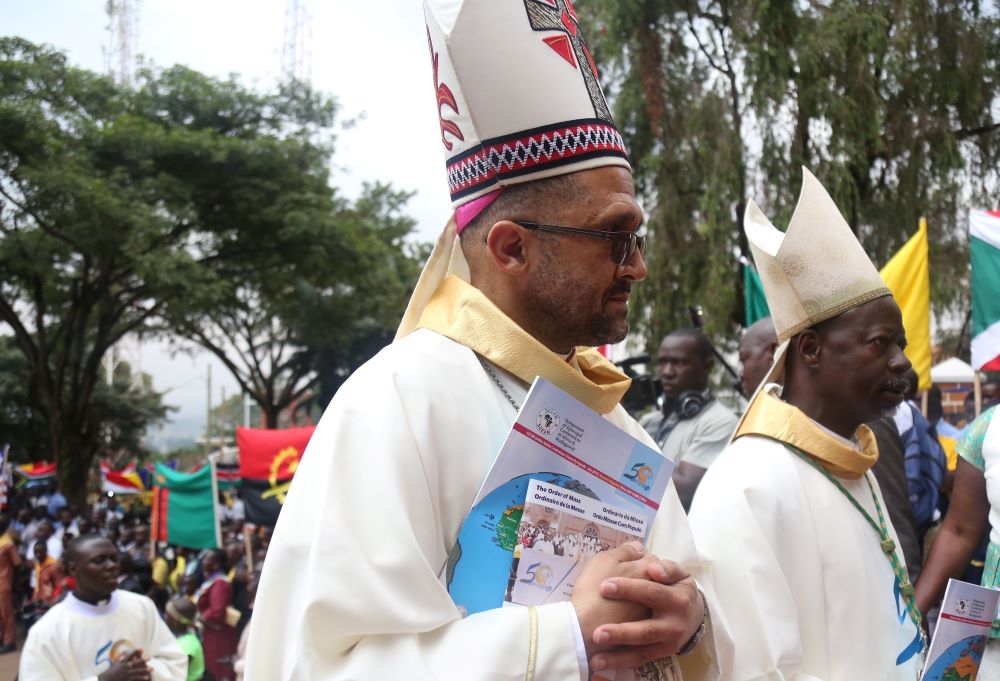Bishop Sithembele Sipuka of Mthatha, South Africa, (left) is shown here at the opening Mass of the weeklong meeting of the Symposium of Episcopal Conferences of Africa and Madagascar in Kampala, Uganda, July 21, 2019. (CNS/Courtesy of SECAM)