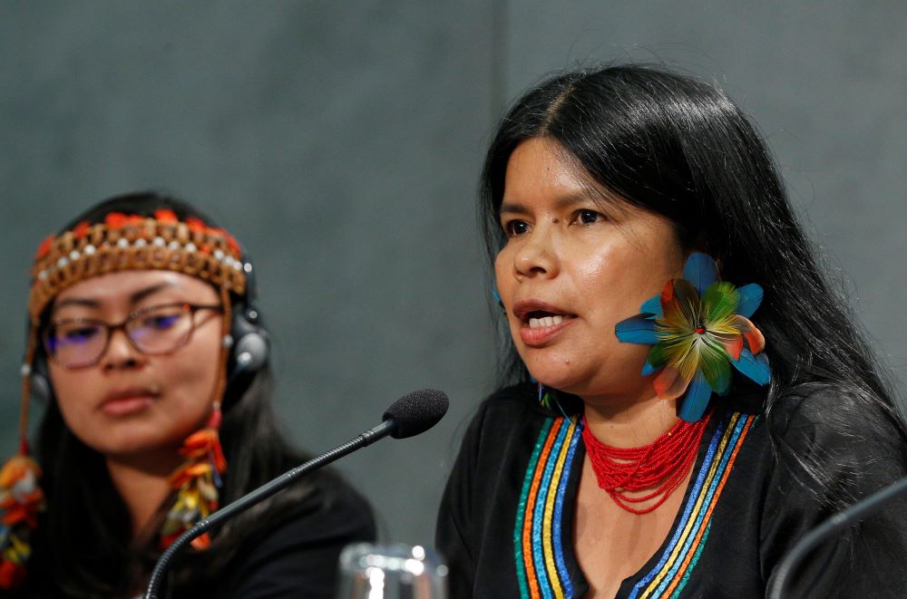 Patricia Gualinga, an indigenous rights defender from Ecuador, speaks at a news conference to discuss the Synod of Bishops for the Amazon at the Vatican Oct. 17, 2019. Also pictured is Leah Rose Casimero, an indigenous representative from Guyana. 