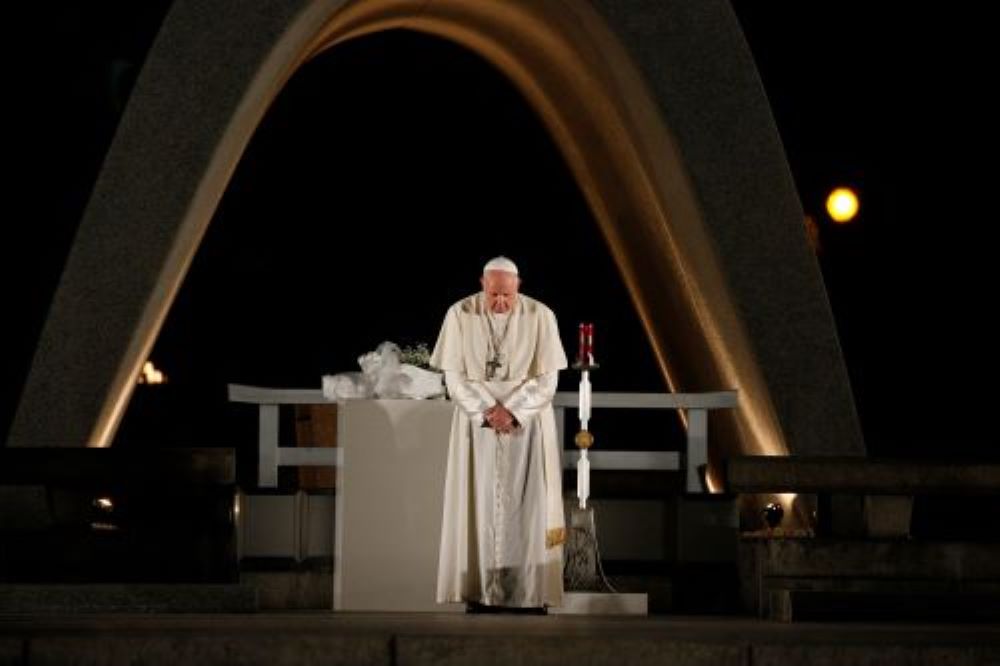 Pope Francis participates in a moment of silence at the Hiroshima Peace Memorial in Japan in 2019. "The use of atomic energy for purposes of war is immoral, just as the possessing of nuclear weapons is immoral," the pope said. (CNS/Paul Haring)