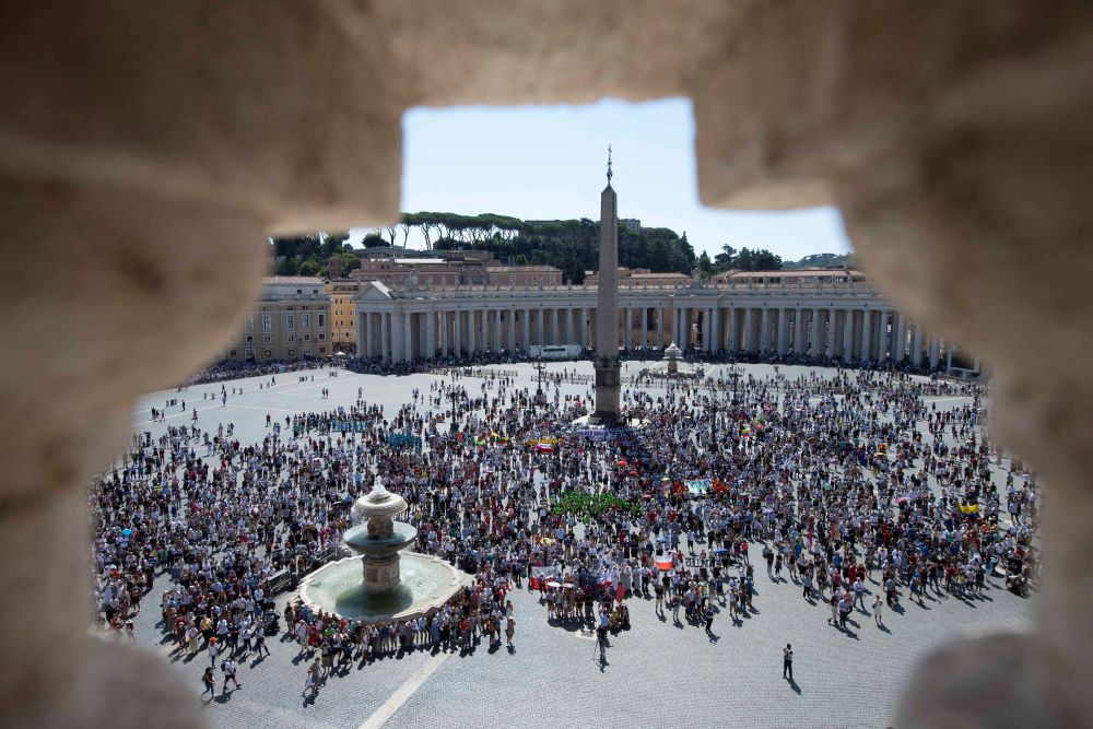 The crowd in St. Peter's Square is pictured as Pope Francis leads the Angelus from the window of his studio overlooking the square at the Vatican Sept. 5. (CNS/Vatican Media)