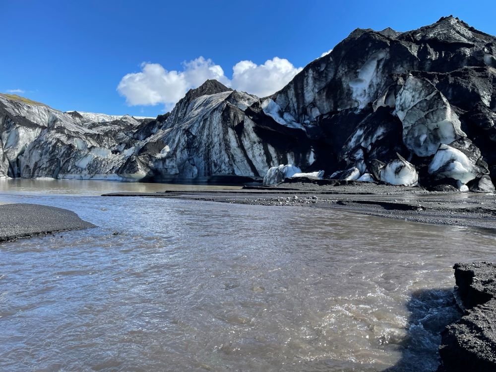 Signs leading up to the Sólheimajökull Glacier in southern Iceland warn visitors to beware of melting ice. (Courtesy of Eric Clayton)