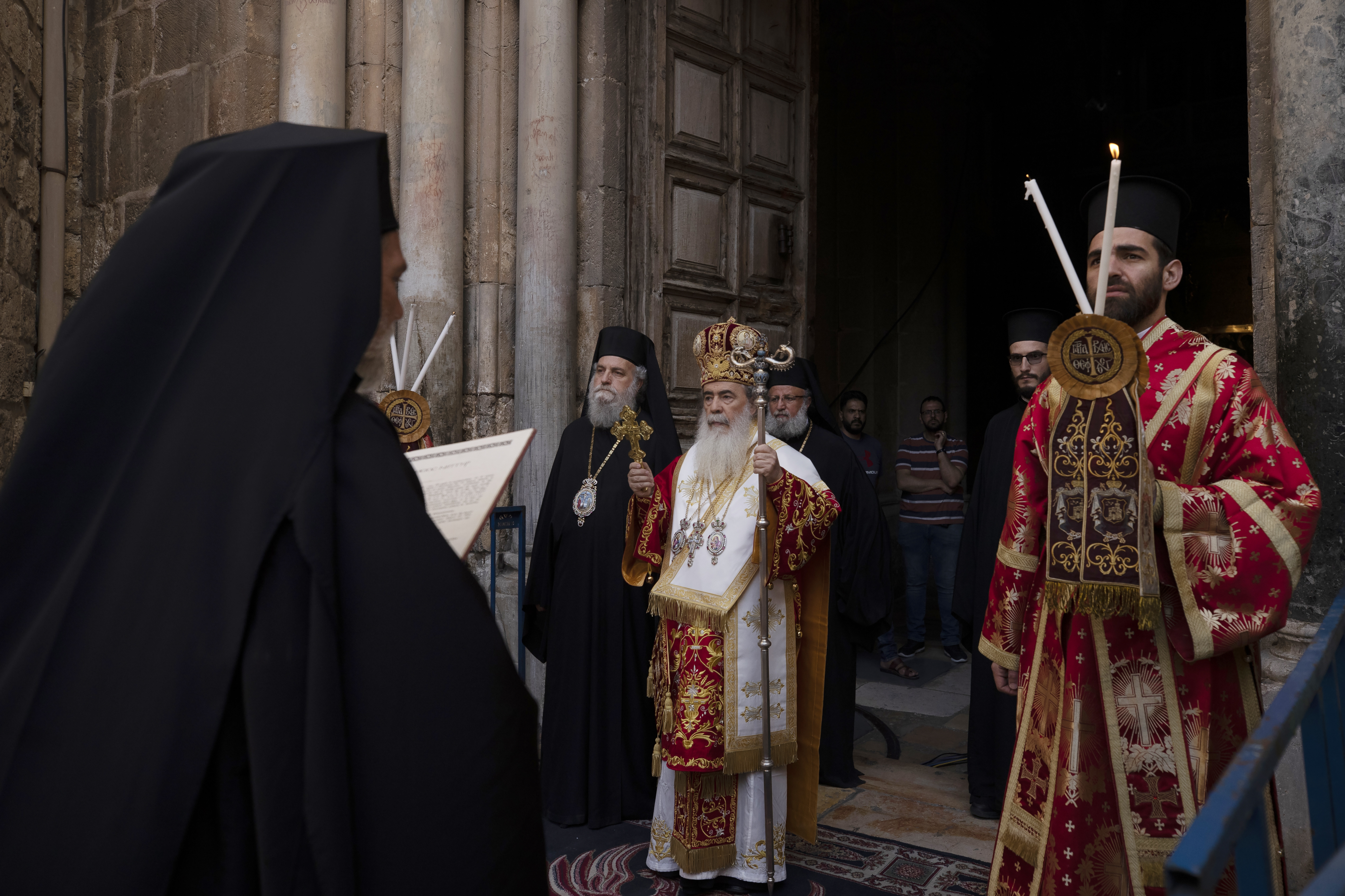 Greek Orthodox Patriarch of Jerusalem Theophilos III, center, walks in procession for the Washing of the Feet ceremony during the orthodox Holy Week at the Church of Holy Sepulchre, Thursday, April 29, 2021. (AP Photo/Maya Alleruzzo)