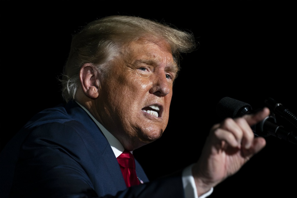 President Donald Trump speaks during a campaign rally at Orlando Sanford International Airport Oct. 12 in Sanford, Florida. (AP Photo/Evan Vucci) President Donald Trump speaks during a campaign rally at Orlando Sanford International Airport Oct. 12 in Sanford, Florida. (AP Photo/Evan Vucci)