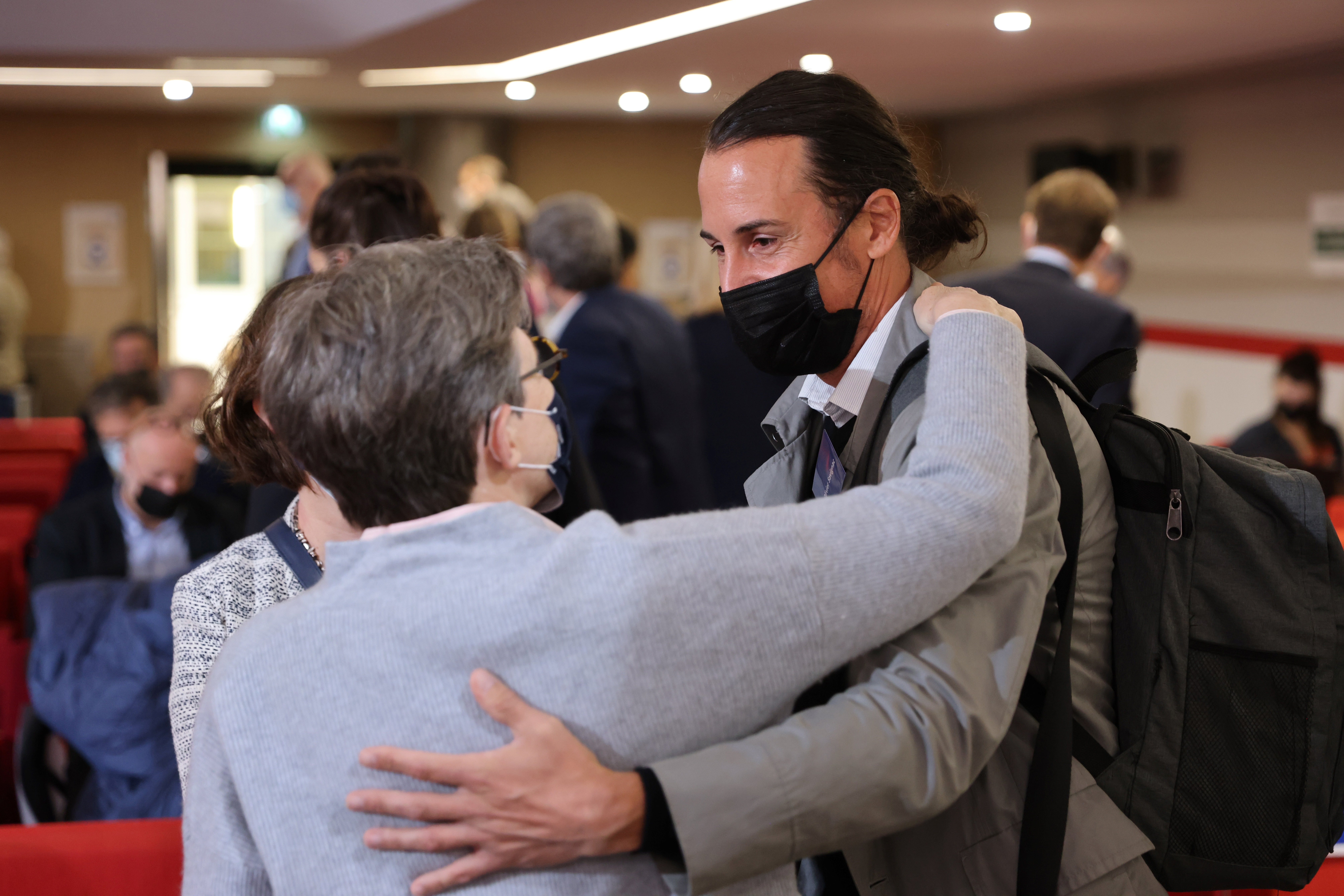 Olivier Savignac, right, one of the victims, greets an attendee during the publishing of a report by an independant commission into sexual abuse by church officials (Ciase), Tuesday, Oct. 5, 2021, in Paris. A major French report released Tuesday found tha Olivier Savignac, right, one of the victims, greets an attendee during the publishing of a report by an independant commission into sexual abuse by church officials (Ciase), Tuesday, Oct. 5, 2021, in Paris. A major French report released Tuesday found tha