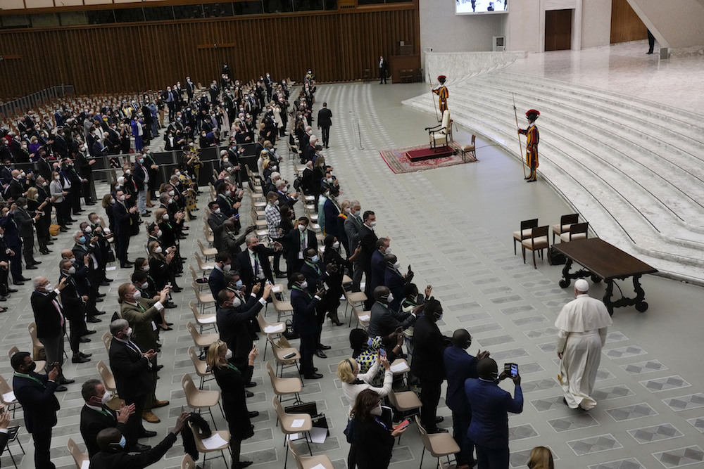 Pope Francis arrives to meet with the participants at the interparliamentary meeting on the U.N. climate conference, COP26, in the Paul VI Hall at the Vatican Oct. 9. (AP Photo/Gregorio Borgia)