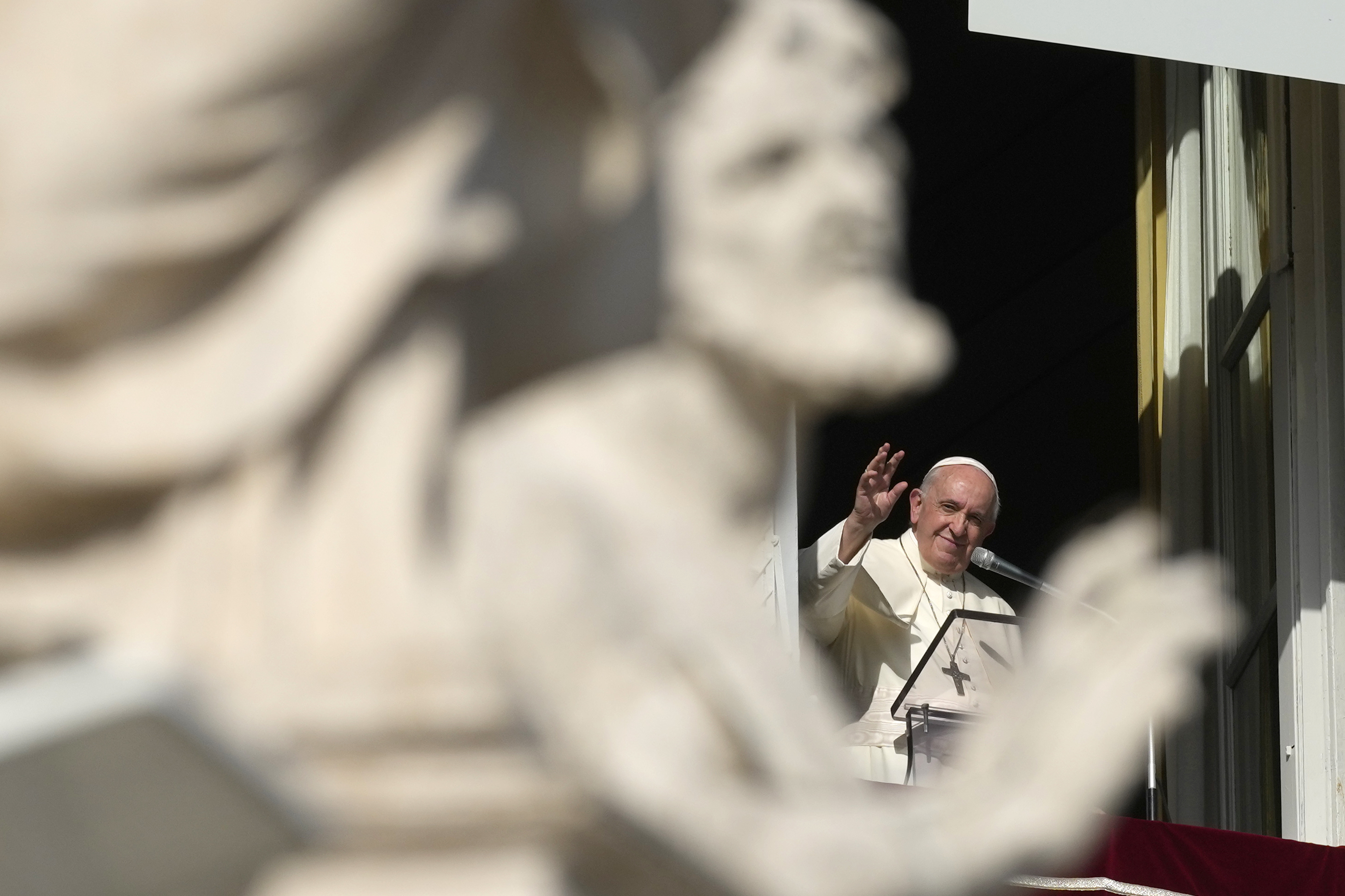 Pope Francis waves during the Angelus noon prayer from the window of his studio overlooking St. Peter's Square, at the Vatican, Sunday, Nov. 7, 2021. (AP Photo/Alessandra Tarantino) Pope Francis waves during the Angelus noon prayer from the window of his studio overlooking St. Peter's Square, at the Vatican, Sunday, Nov. 7, 2021. (AP Photo/Alessandra Tarantino)
