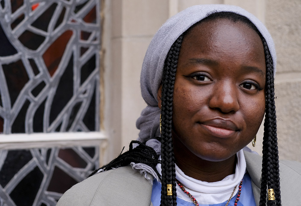 Nathalie Charles poses for a portrait outside the Princeton University Chapel Dec. 8 in Princeton, New Jersey. (AP photo/Luis Andres Henao)