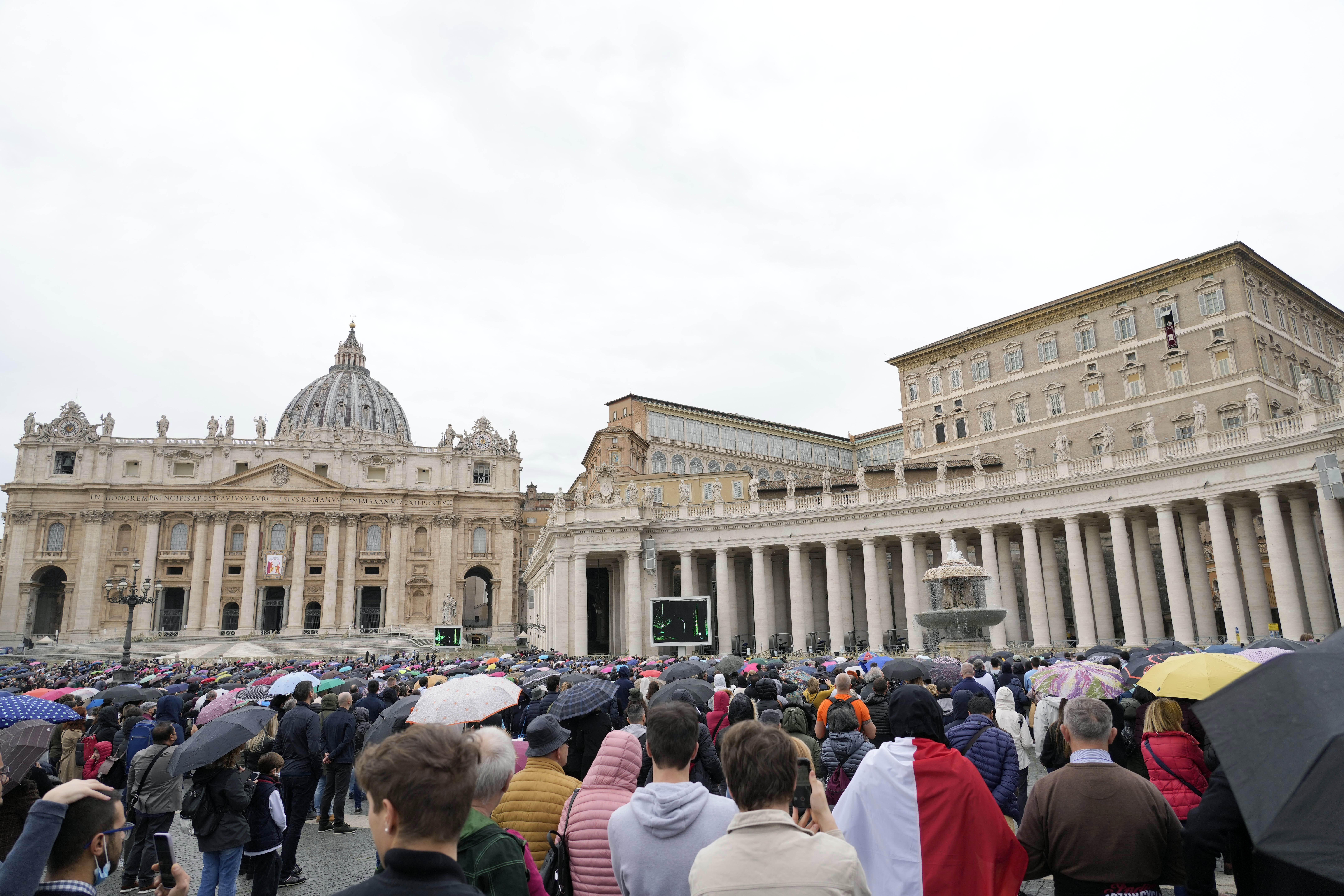 Faithful gather to listen to Pope Francis' Angelus noon prayer in St. Peter's Square, at the Vatican, Sunday, Nov. 14, 2021. (AP Photo/Gregorio Borgia, File)