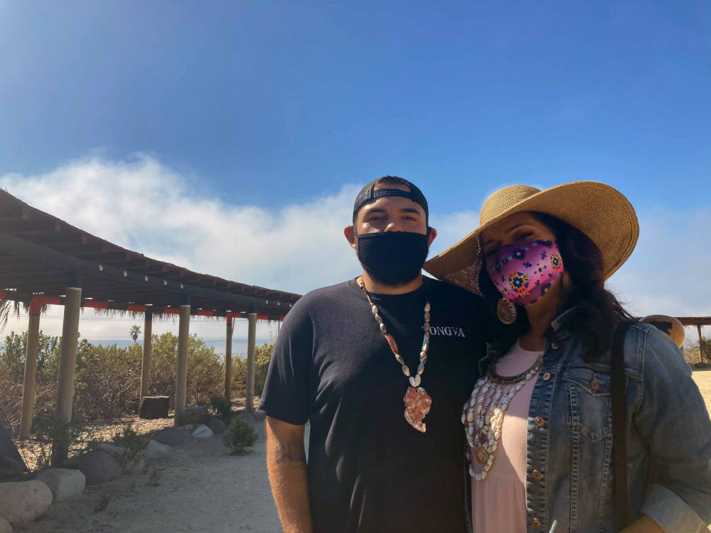 Josh Andujo, left, tribal member of Gabrielino Tongva San Gabriel Band of Mission Indians, and Carla Munoz, tribal councilwoman of the Costanoan Rumsen Carmel Tribe, Sunday, Oct. 17, 2021, in Malibu, California. (RNS photo/Alejandra Molina)