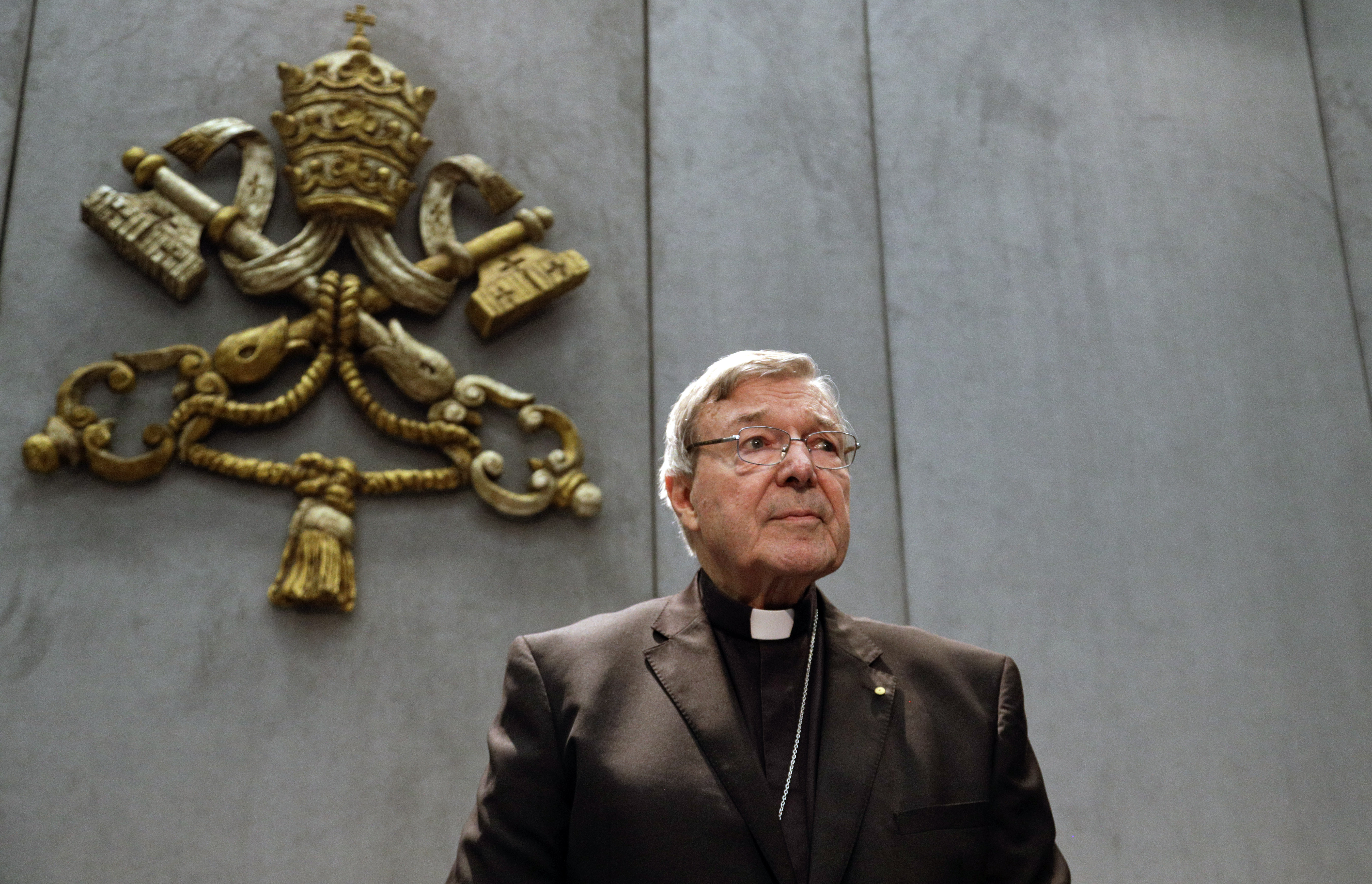In this June 29, 2017, file photo, Cardinal George Pell prepares to make a statement, at the Vatican. (AP Photo/Gregorio Borgia, File)