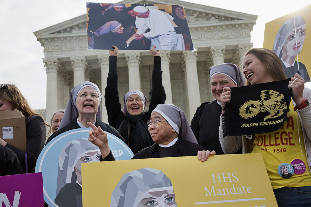 Nuns with the Little Sisters of the Poor rally outside the Supreme Court in Washington March 23, 2016, as the court hears arguments to allow birth control in health care plans. (AP Photo/Jacquelyn Martin)