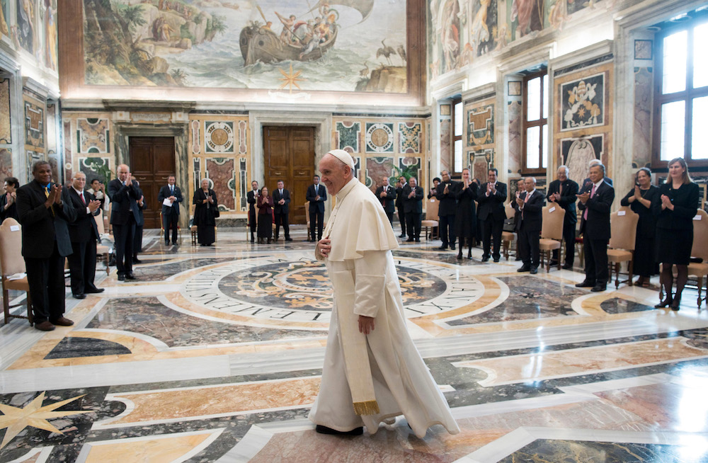 Pope Francis walks in the Clementine Hall after meeting with a delegation of Pacific leaders to discuss climate issues, at the Vatican in November 2017. Francis will be one of several world leaders to present a joint declaration to the U.N. climate confer