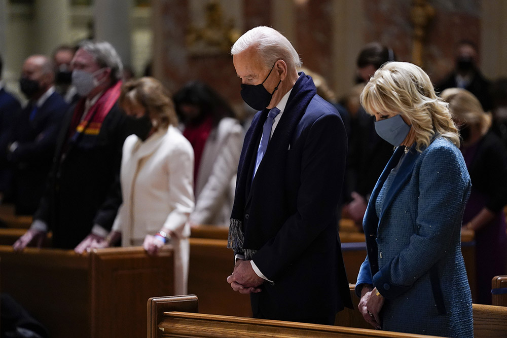 On Jan. 20, then-President-elect Joe Biden and his wife, Jill Biden, attend Mass at the Cathedral of St. Matthew the Apostle during Inauguration Day ceremonies in Washington. (AP Photo/Evan Vucci) On Jan. 20, then-President-elect Joe Biden and his wife, Jill Biden, attend Mass at the Cathedral of St. Matthew the Apostle during Inauguration Day ceremonies in Washington. (AP Photo/Evan Vucci)