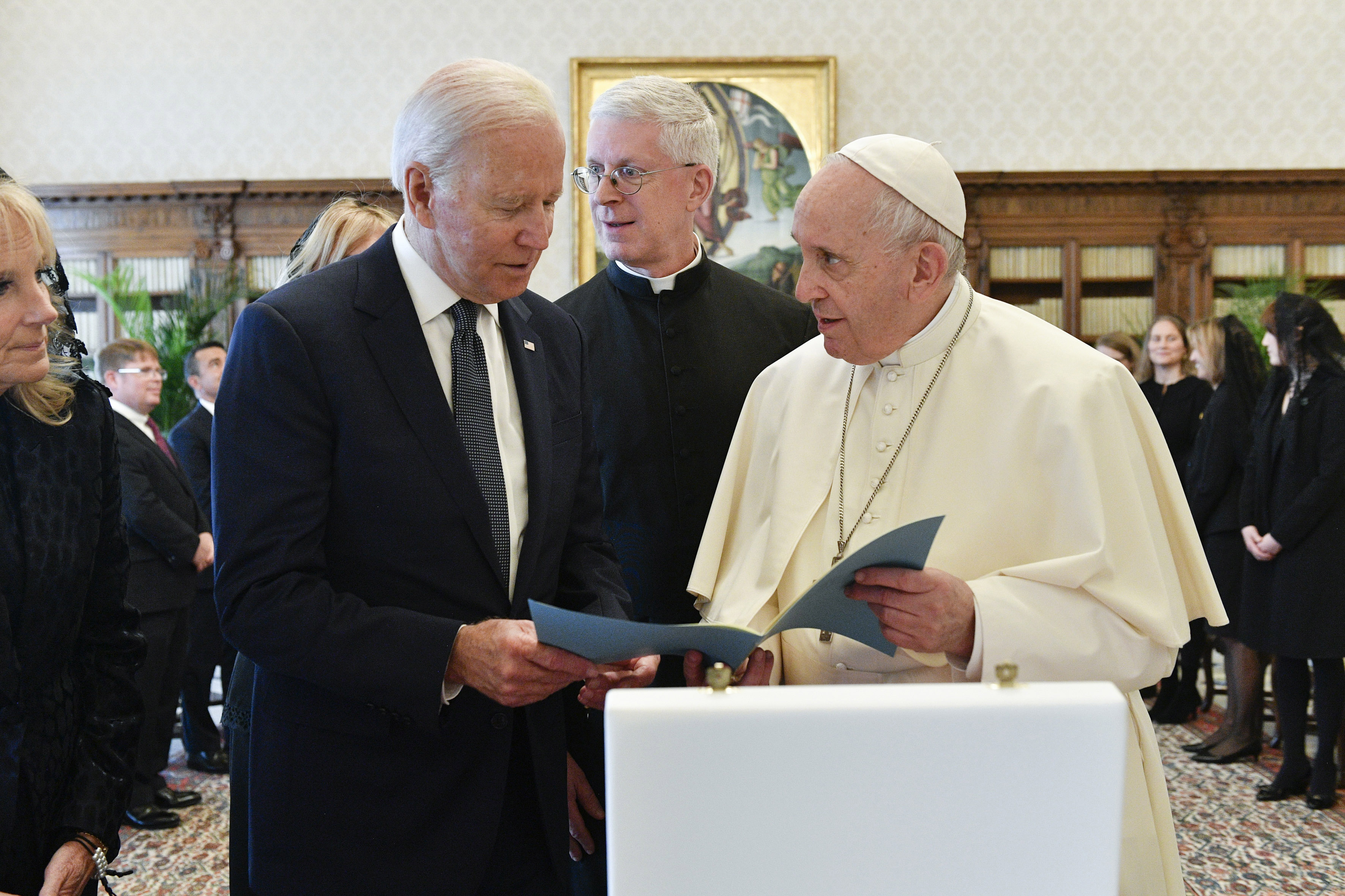 President Joe Biden, left, exchanges gifts with Pope Francis as they meet at the Vatican, Friday, Oct. 29, 2021. Photo by Vatican Media President Joe Biden, left, exchanges gifts with Pope Francis as they meet at the Vatican, Friday, Oct. 29, 2021. Photo by Vatican Media