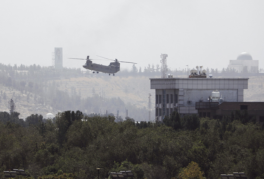U.S. personnel were evacuated from the U.S. embassy in Kabul, the Afghan capital, as Taliban insurgents broke through the city's defensive line Aug. 15. (AP/Rahmat Gul) U.S. personnel were evacuated from the U.S. embassy in Kabul, the Afghan capital, as Taliban insurgents broke through the city's defensive line Aug. 15. (AP/Rahmat Gul)