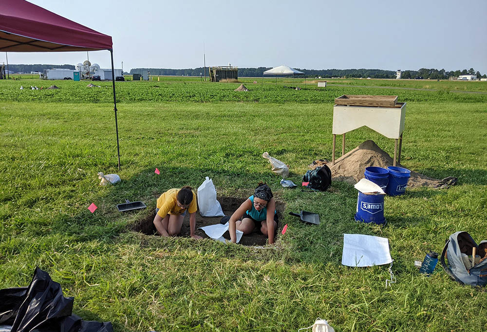 Field technicians Colleen Betti, left, and Danielle Harris-Burnett participate in an archeological dig at a former plantation in St. Inigoes, in southern Maryland, July 7. (RNS/Ken Homan, SJ)
