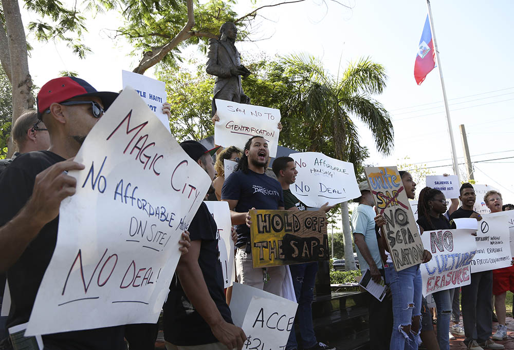 Protesters rally against the proposed Magic City Innovation District on June 20, 2019, in the Little Haiti neighborhood of Miami.