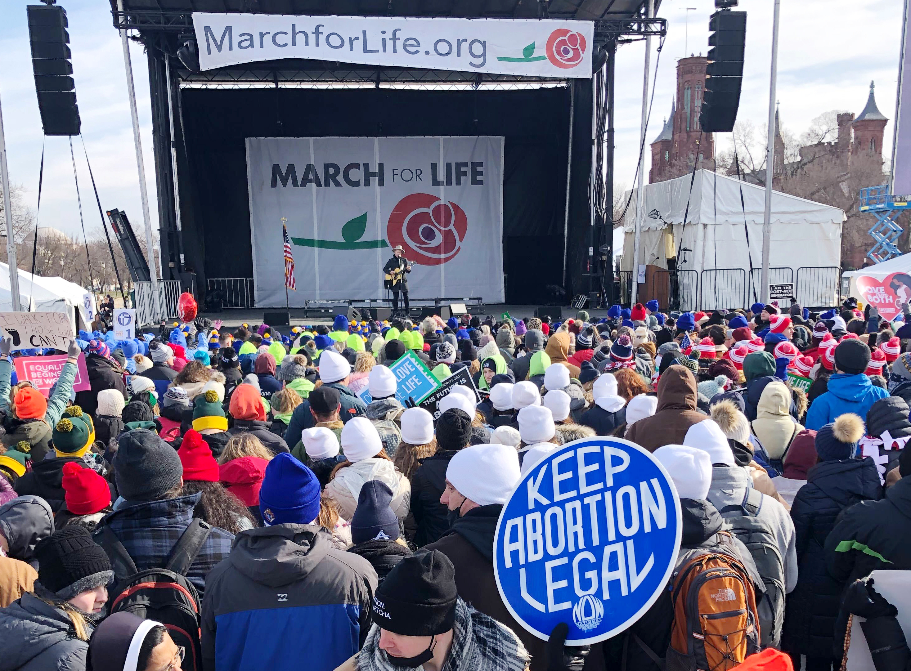 People attend the March for Life rally on the National Mall in Washington, Friday, Jan. 21, 2022. The March for Life, for decades an annual protest against abortion, arrives this year as the Supreme Court has indicated it will allow states to impose tight People attend the March for Life rally on the National Mall in Washington, Friday, Jan. 21, 2022. The March for Life, for decades an annual protest against abortion, arrives this year as the Supreme Court has indicated it will allow states to impose tight