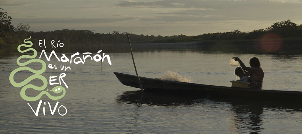 A poster proclaims that Peru's Marañón River is a living being. (Quisca Producciones and Radio Ucamara)