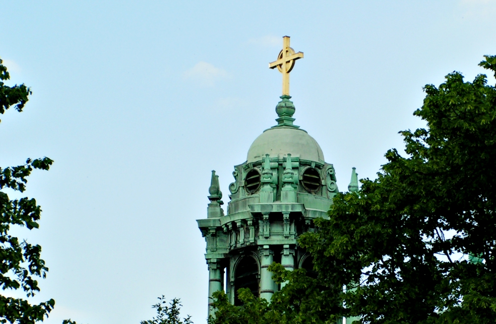 A cross is seen atop a building on the campus of the College of the Holy Cross in Worcester, Massachusetts. (Wikimedia Commons/George Rypysc III)
