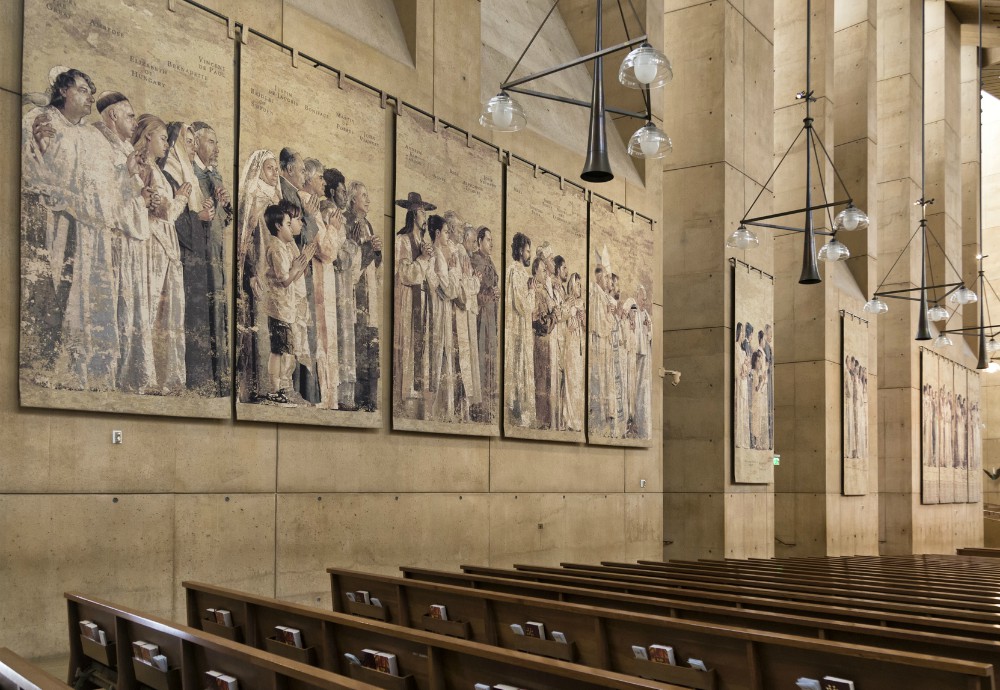 Tapestries depicting saints are seen in the Cathedral of Our Lady of the Angels in Los Angeles. (Dreamstime/Luis E. Torres Franco)