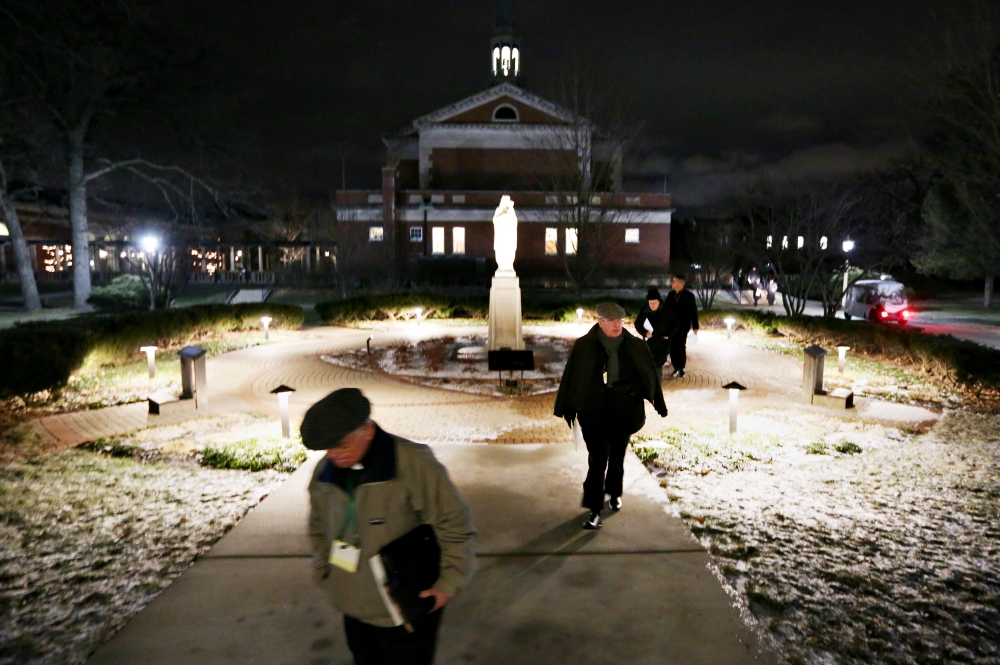 Bishops walk on the grounds of Mundelein Seminary Jan. 2 at the University of St. Mary of the Lake in Illinois, near Chicago. The U.S. bishops began their Jan. 2-8 retreat at the seminary. (CNS/Bob Roller)