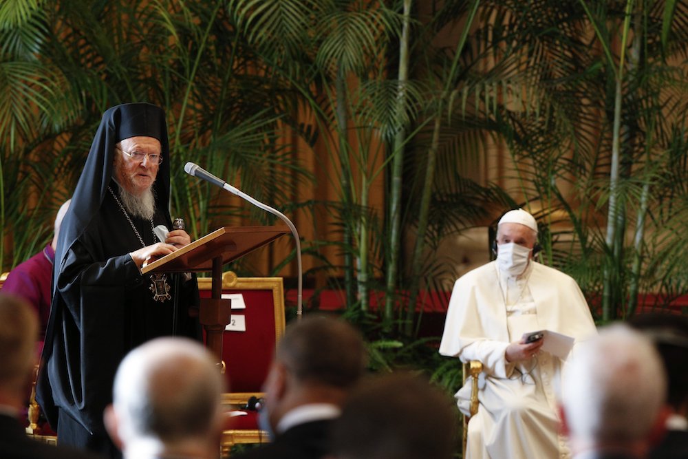 Orthodox Ecumenical Patriarch Bartholomew of Constantinople addresses the "Faith and Science: Towards COP26" meeting at the Vatican, as Pope Francis looks on. (CNS/Paul Haring)