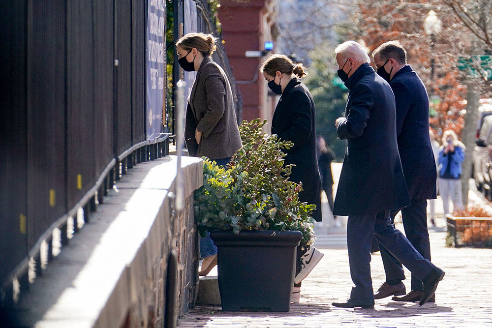 President Joe Biden and family members enter Holy Trinity Catholic Church in Washington Jan. 24. (CNS/Reuters/Erin Scott)