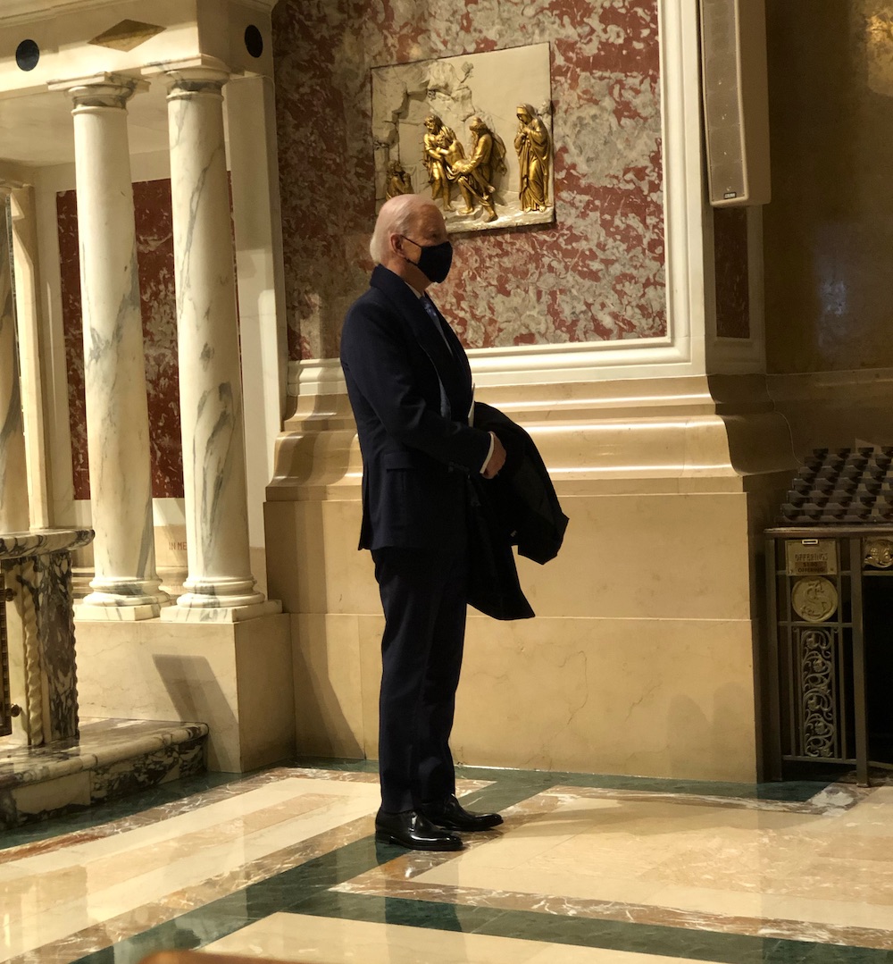 Then President-elect Joe Biden listens to the last verse of "America the Beautiful" before greeting Renée Fleming at the end of Mass Jan. 20, 2021, at Cathedral of St. Matthew the Apostle in Washington, D.C. (Thomas Stehle) Then President-elect Joe Biden listens to the last verse of "America the Beautiful" before greeting Renée Fleming at the end of Mass Jan. 20, 2021, at Cathedral of St. Matthew the Apostle in Washington, D.C. (Thomas Stehle)