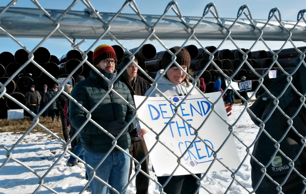 Brenna Cussen Anglada of St. Isidore Catholic Worker Farm heads a line of protesters risking arrest at a pipeline storage yard in Carlton County, Minnesota, April 9. (NCR photo/Maria Benevento) Brenna Cussen Anglada of St. Isidore Catholic Worker Farm heads a line of protesters risking arrest at a pipeline storage yard in Carlton County, Minnesota, April 9. (NCR photo/Maria Benevento)