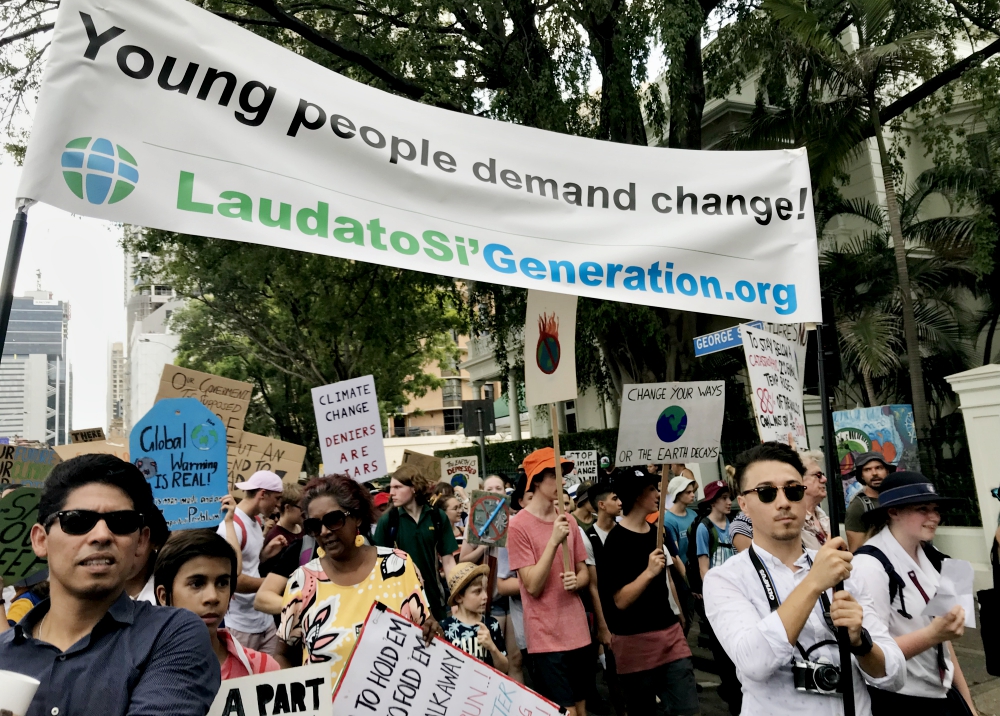 Catholics in Brisbane, Australia, take part in a global climate strike March 15 protesting a lack of action by government leaders in addressing climate change. (Laudato Si' Generation)